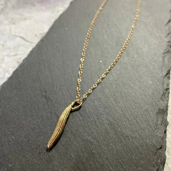 Miniature Gold Molokhia Seed Pod Pendant Cocorose London