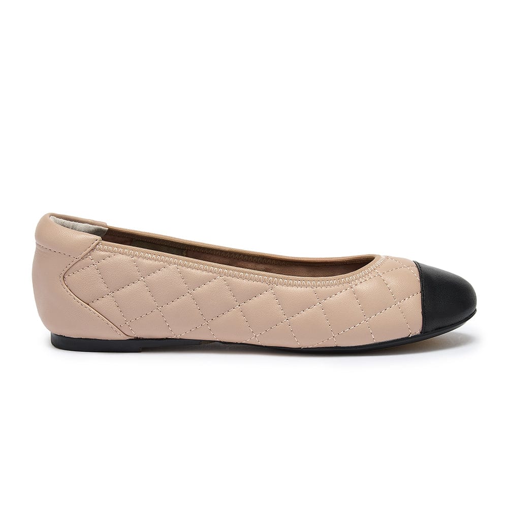 Quilted leather ballet flat in nude with black toe cap